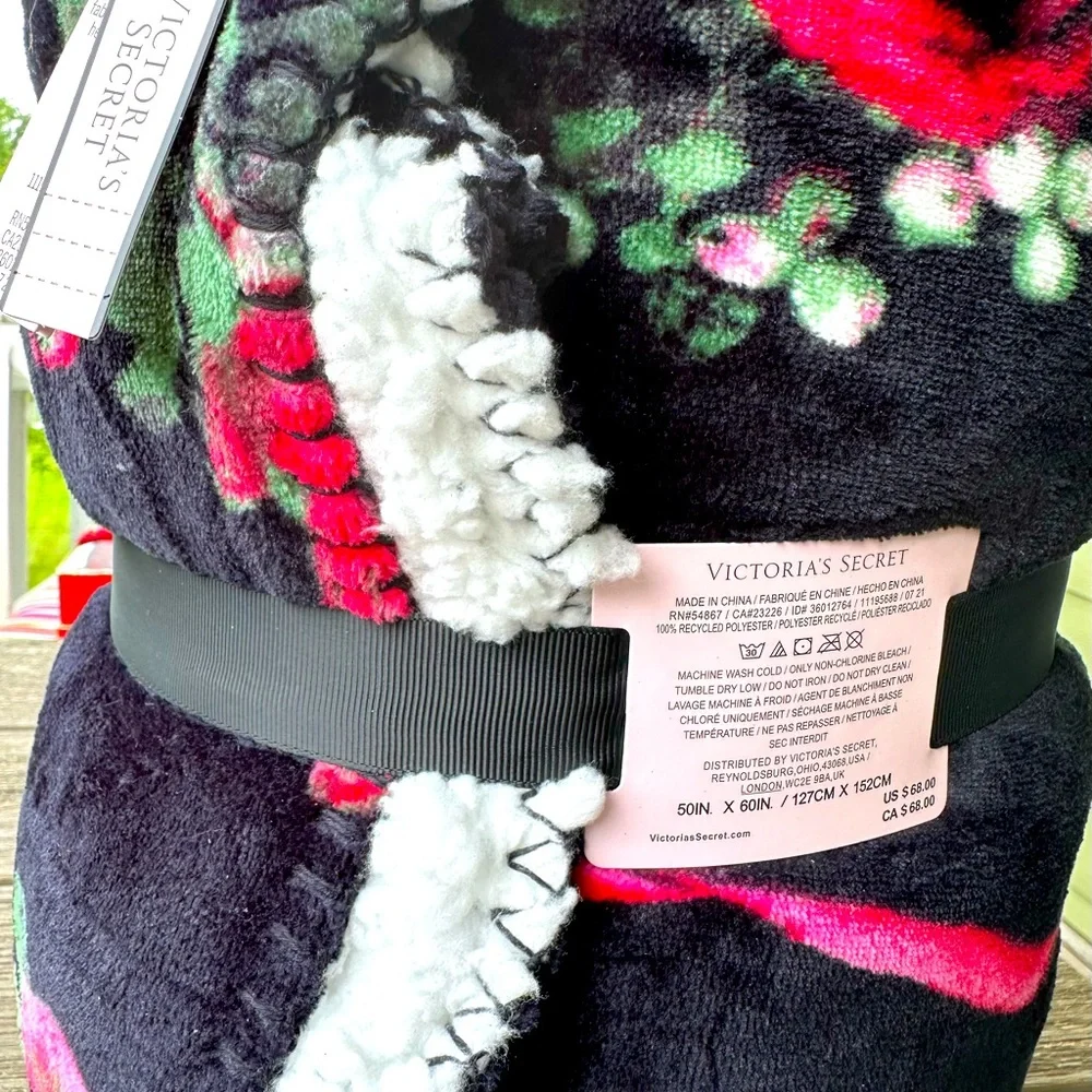NEW Victoria’s Secret Sherpa Blanket 50”X 60” blk w/ red & pink flowers.